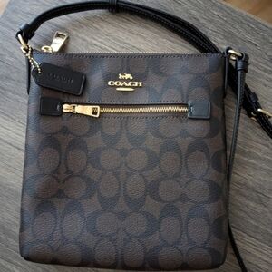 COACH Mini Rowan File Bag In Signature Canvas.